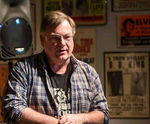 Bop Shop Records owner Tom Kohn introduces the band at an April 2015 in-store performance. (Photo by Aaron Winters)