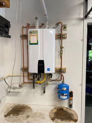 More garage space + endless hot water after replacing their two-tank system with a tankless one