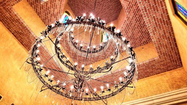 Massive Spanish chandelier in foyer