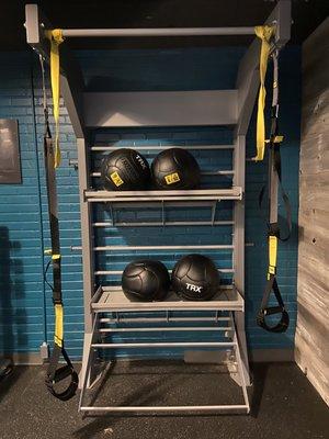 TRX straps & medicine balls in the wellness center