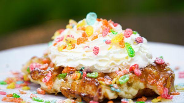 Fruity Pebbles Waffle: Fresh Liege Waffle, Lemon Curd, Fruity Pebbles Cereal topped with fresh house-made Whipped cream