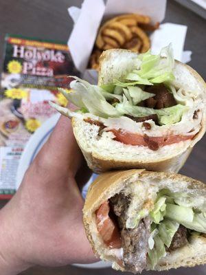 Turkey grinder & cheeseburger grinder. Curly fries take the win.