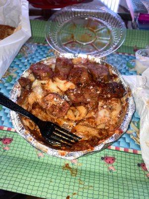 Baked mostaccioli w/meat sauce and a side of Italian sausage.