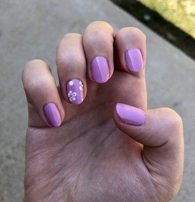 My daughters nails with flower designs.