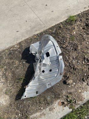 left with loose screws after oil change, resulting in crumpled skid plate