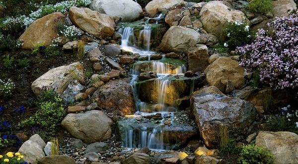 Multiple levels on the waterfall are accented by lights inside to allow you to enjoy the view into the night.