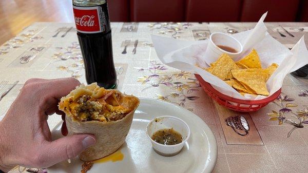 Breakfast burrito with chorizo, bacon, potatoes and AWESOMENESS! Chips/salsa & Coke from Mexico.