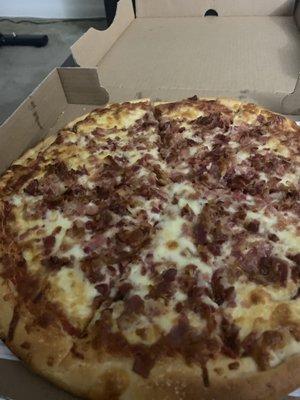 Medium extra-bacon pizza