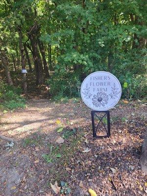 Sign to lead you thru the little woods to the flower farm.