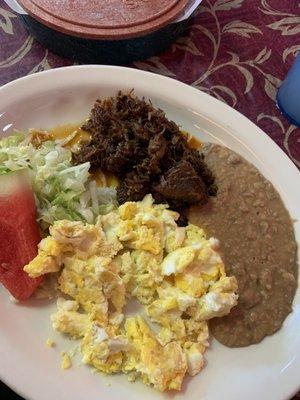 Barbacoa Plate with scrambled eggs, tortillas on side