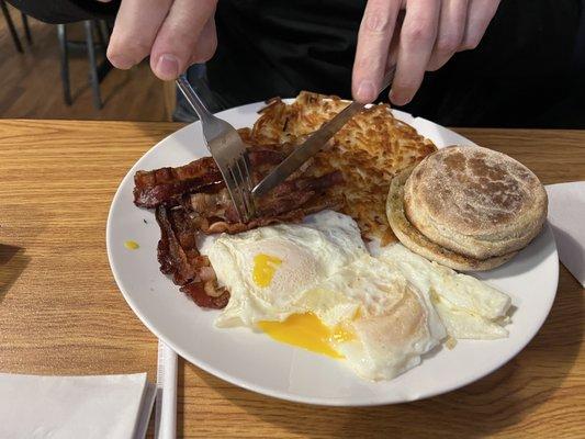 Bacon eggs hashbrowns English muffin