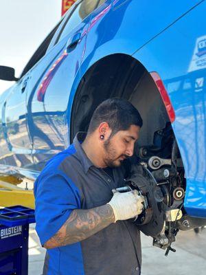 Technician Leon working on one of our fleet company's vehicles.