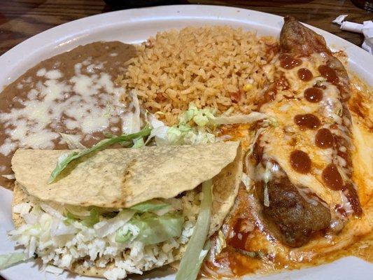 Chile relleno, rice, beans and a taco.