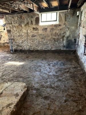 Basement flooding??? Here we removed the existing concrete floor and dirt for French drain installation and new concrete pour