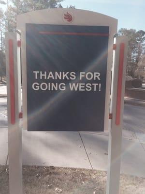 Signage on the campus using the "Go West" branding.