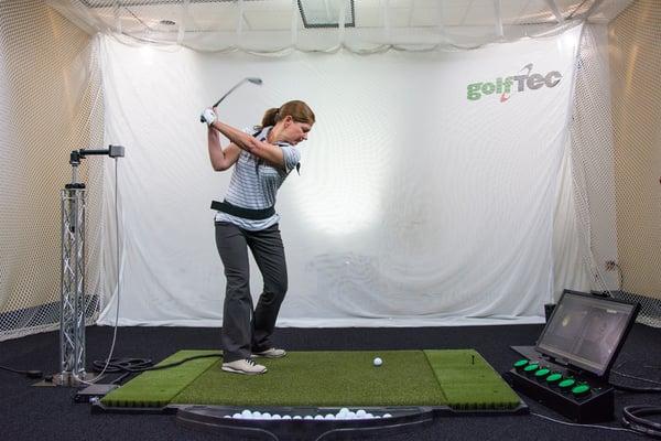 Indoor video golf practice in Oxnard.