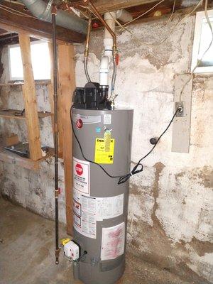 Power vent water heater installation.