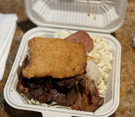 Bento: Fried Fish, BBQ chicken, Teriyaki Steak, Spam with Mac salad and rice. $9.60 after tax