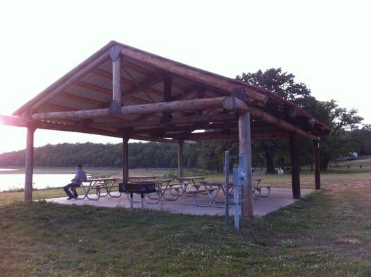 Covered shelter with grill