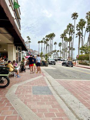 Exterior seating to the left. Beach to the right.