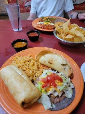 Bottom: Chimi Combo with Rice, Old fashioned taco(puffy), Chalupa(tostada) Top: Cinco Enchiladas