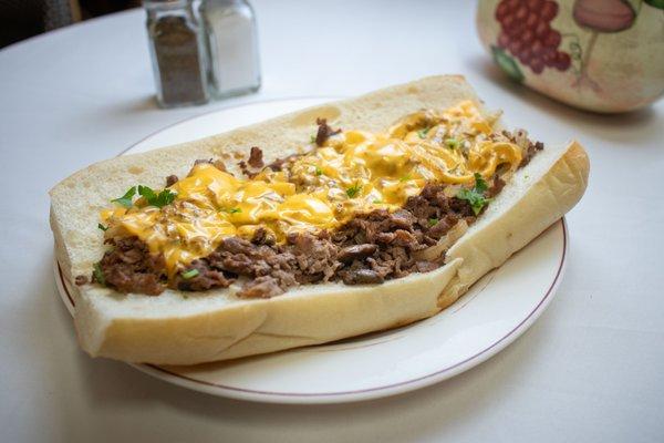 Pork heros: Pork cheese steak hero