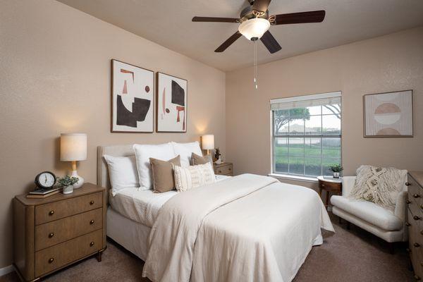 Bedroom with ceiling fan at Crescent Cove at Lakepointe