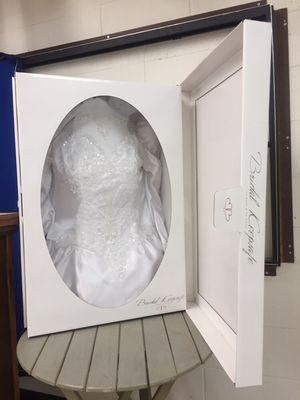 We specialize in wedding gown cleanings and can help preserve your beautiful dress in a lovely keepsake box.