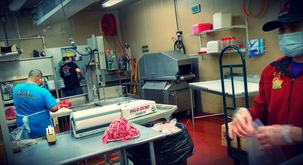 A dozen employees working behind the Meat counter. Very busy open to close everyday