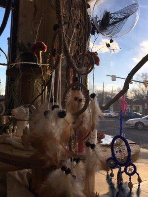 Window display with dream catchers.