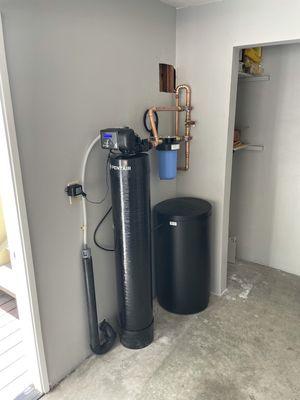 New salt water softener install to protect your fixtures from scale build up