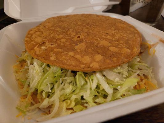 Home photo - Bean tostada, double layered so you can have a crunchy tostada for any toppings that fall off