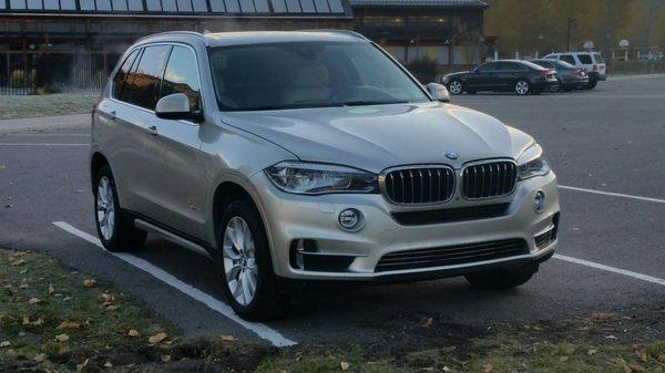 A beautiful 2014 BMW X5 SUV restored to original beauty.