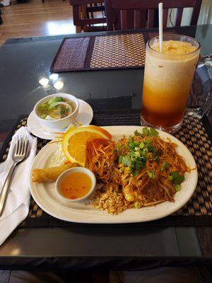 Beef Pad Thai lunch special. It came with veggie soup and an egg roll. I also ordered their Thai tea.