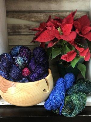 Malabrigo Mecha yarn displayed in a wood knitting bowl hand turned by local artisan David Earls