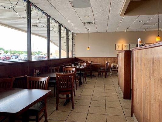 Spacious dining room area with plenty of tables and chairs.