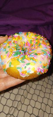 Sprinkle cake donut about to get gobbled up:)