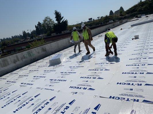 Install TPO roof at commercial building in shoreline