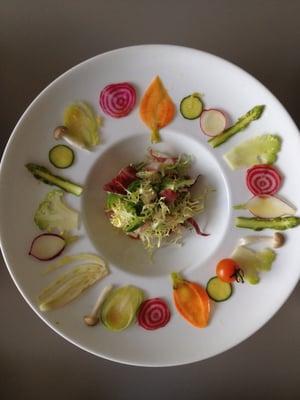 Vegetable carpaccio with tomato pearls