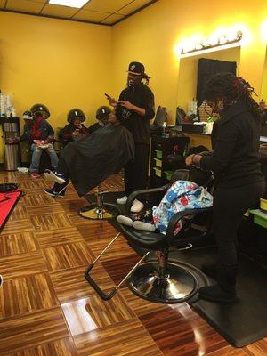 My son getting his locks done