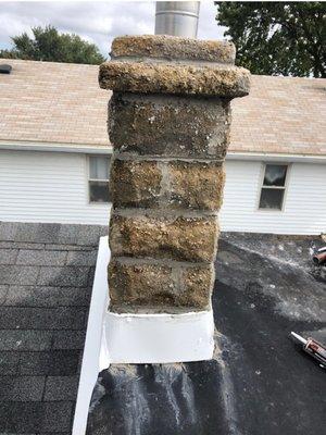 New chimney flashing. And brick power wash