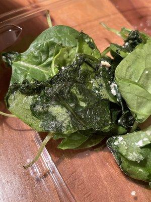 Rotten spinach.