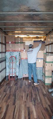 One of our crew members loading our truck.