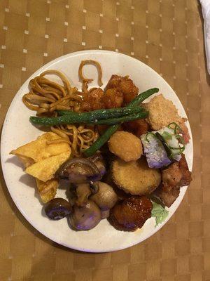 Assortment of food items from buffet. Sept, 2024. .