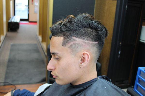 Drop razor fade / Combover with a freestyle design