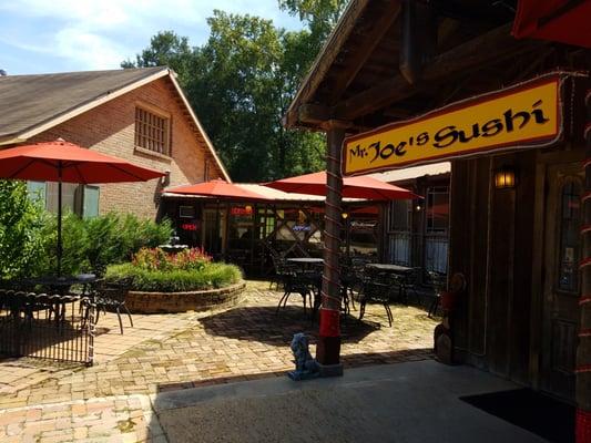 Front entrance and outdoor seating area.