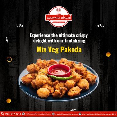 Satisfy your cravings with the ultimate crispy delight! Indulge in our tantalizing Mix Veg Pakoda. Order online now at #SaiSaravanaBhavan!