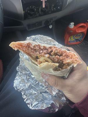 Supposed to be Al Pastor burrito but more rice than anything.