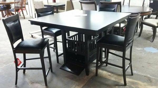 Counter height dinette with wine storage, hanging glass holder, and shelf for place settings.  Closeout priced at $399.99