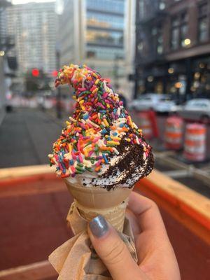 Vanilla ice cream with sprinkles and Oreo